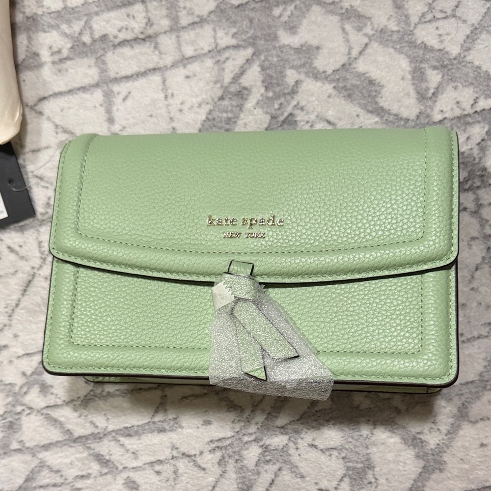 Kate Spade Light mint Green flap crossbody with Tassel